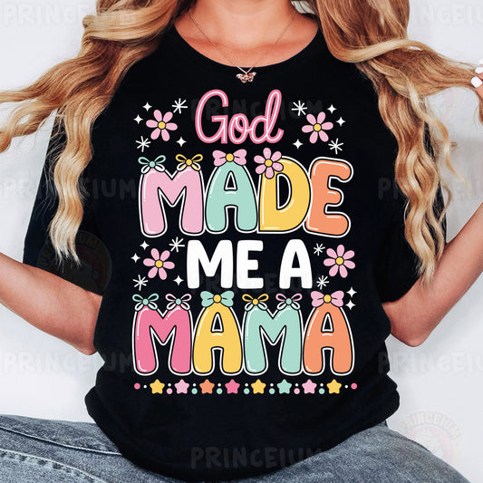 a woman wearing a black shirt that says god made me a mama