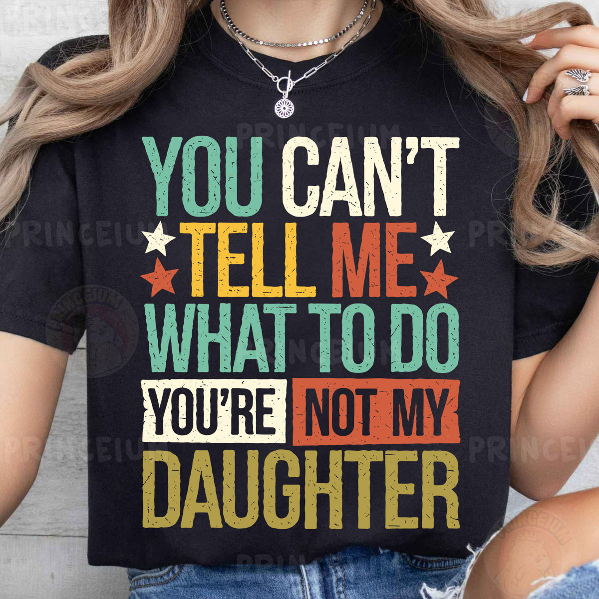a woman wearing a t - shirt that says you can't tell me what