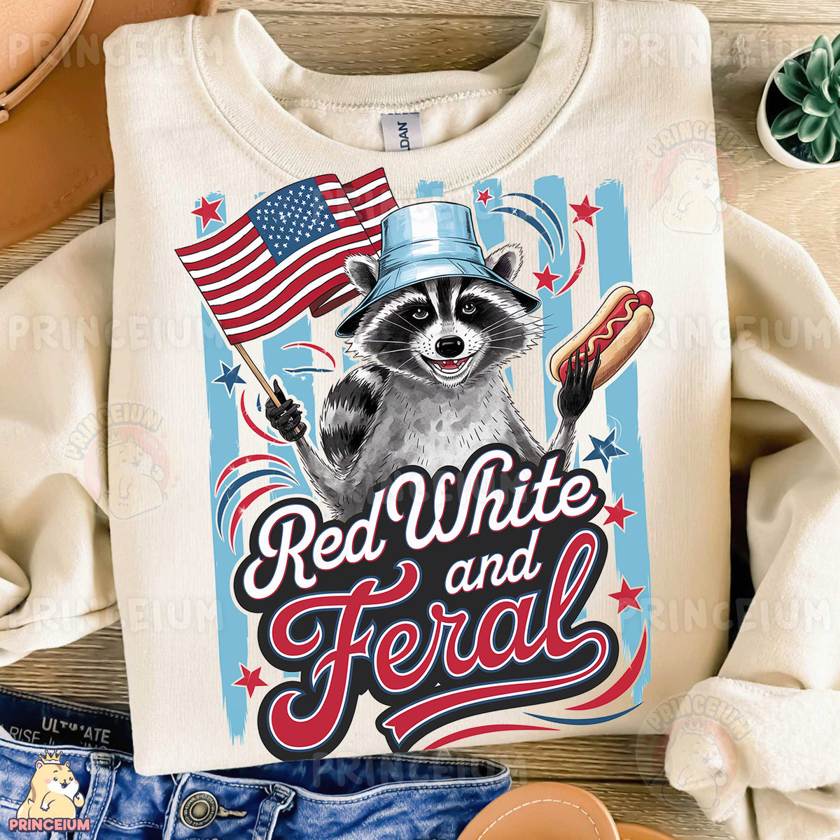 a shirt with a raccoon wearing a hat and holding a hot dog