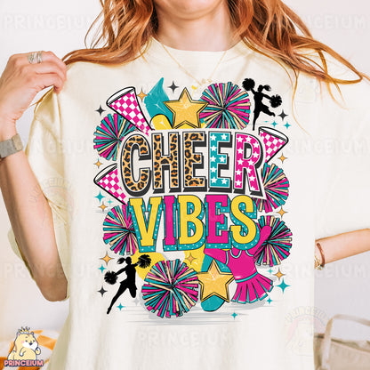 a woman wearing a cheer vibes t - shirt