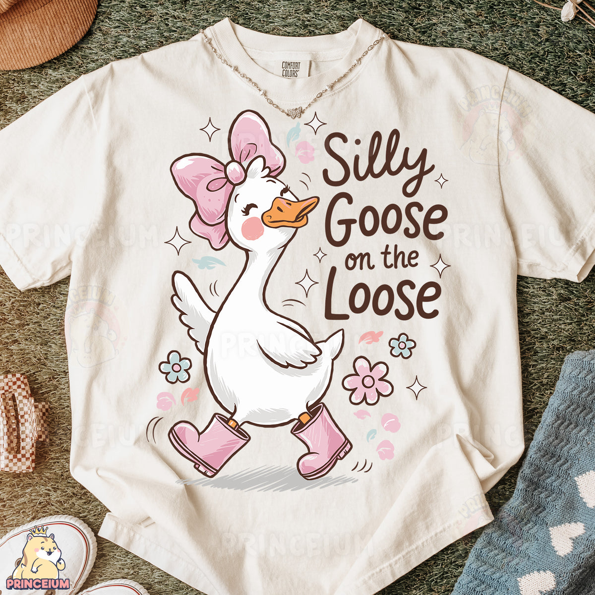 a white t - shirt with a cartoon duck on it