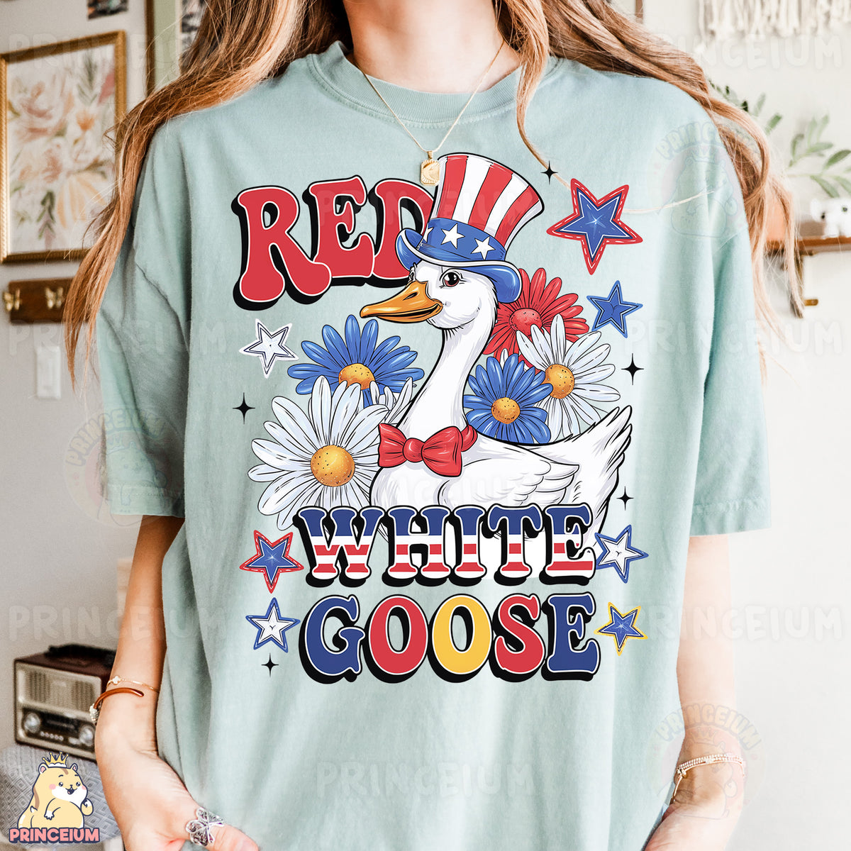 a woman wearing a red, white, and blue goose t - shirt