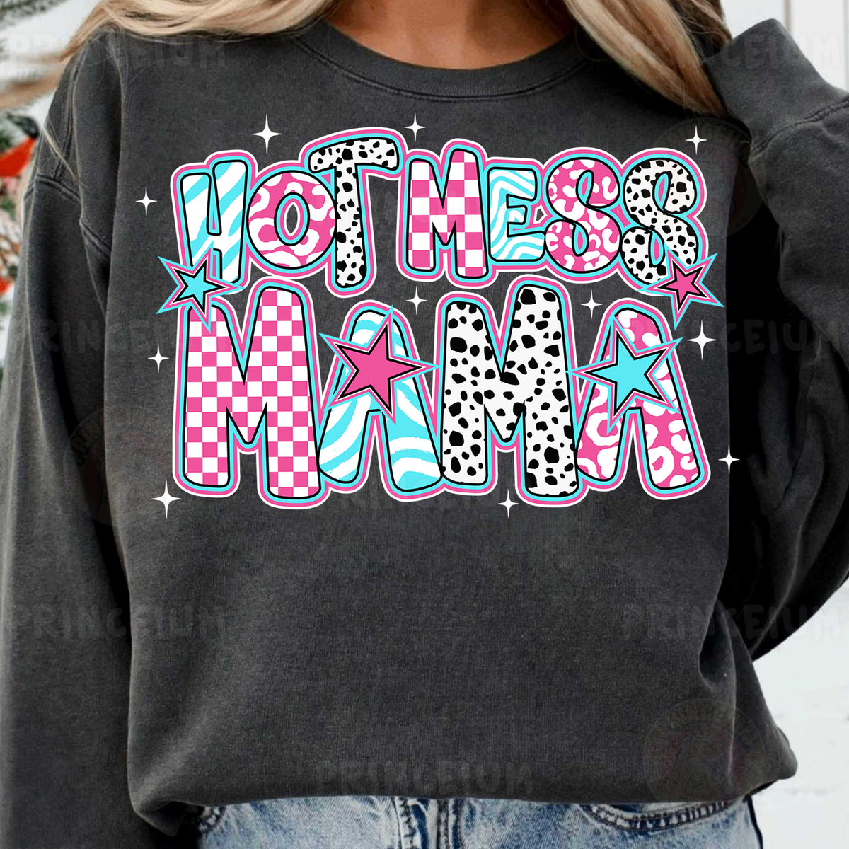 a woman wearing a black sweatshirt with the words mom on it
