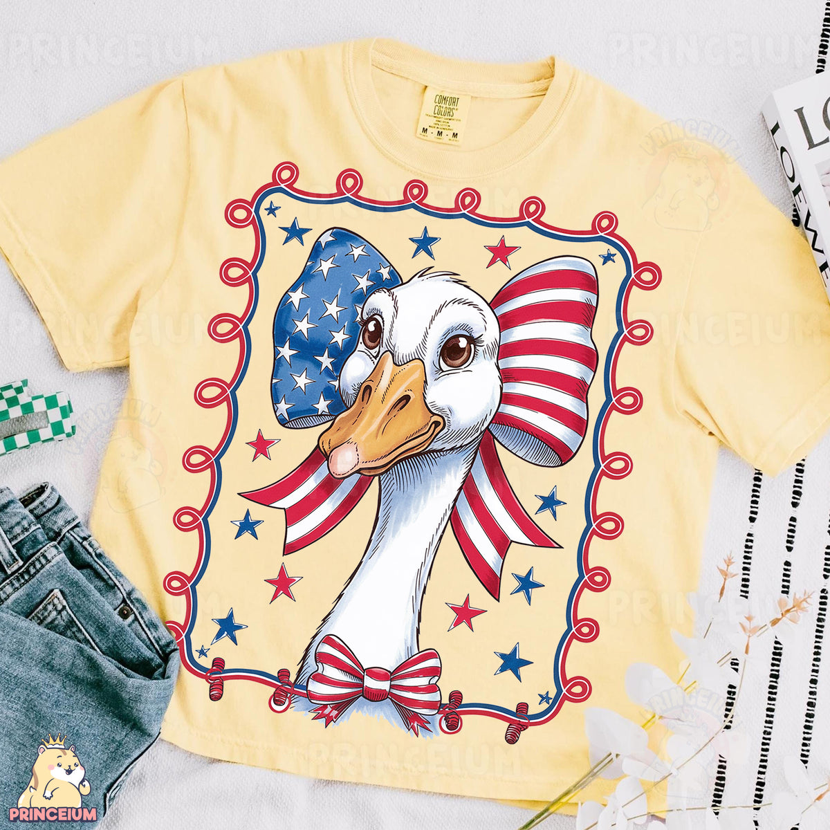 a t - shirt with a picture of a goose wearing an american flag bow tie
