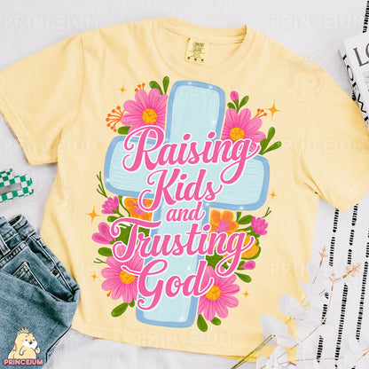 a t - shirt that says raising kids and adjusting god