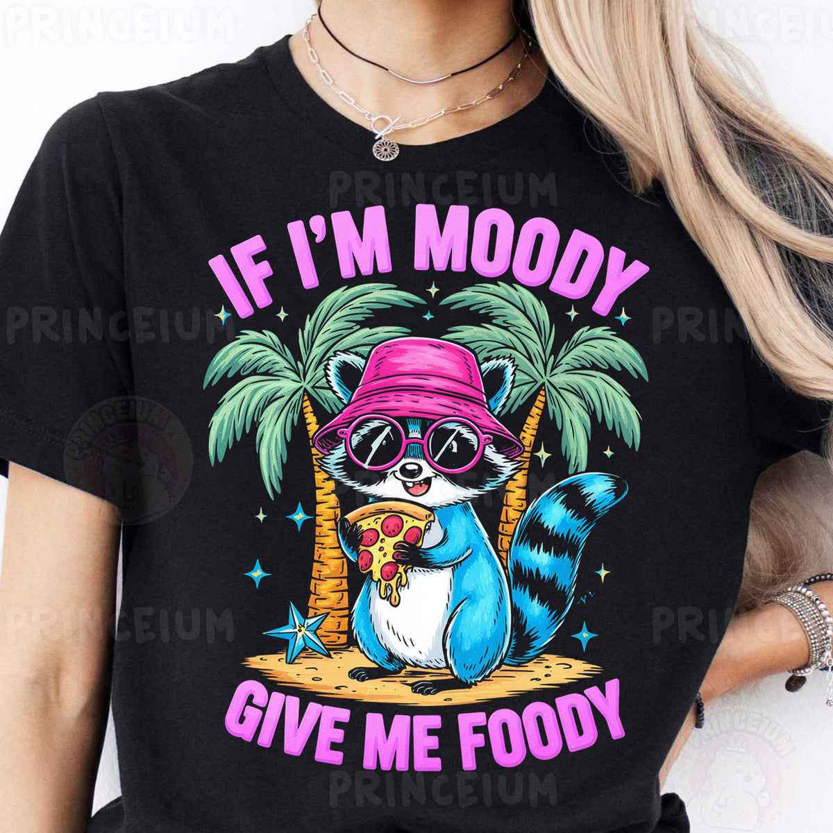 a woman wearing a black shirt with a raccoon wearing a pink hat and