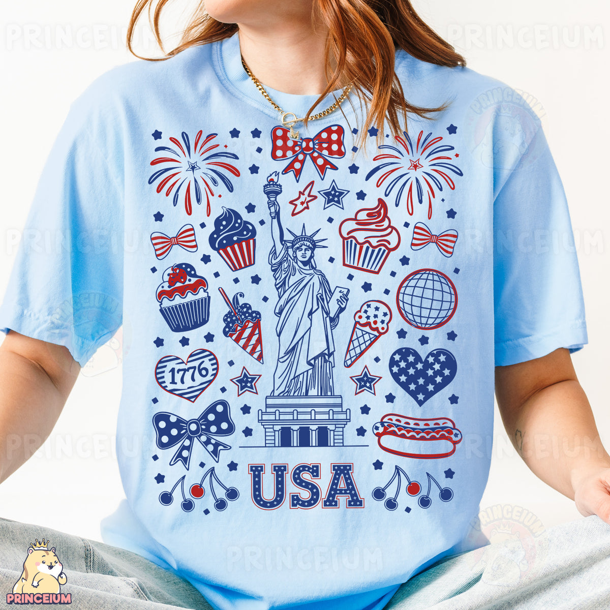 a woman wearing a blue shirt with the statue of liberty on it