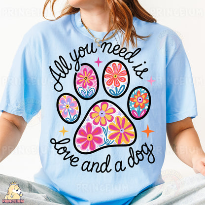 a woman wearing a t - shirt with a dog's paw on it