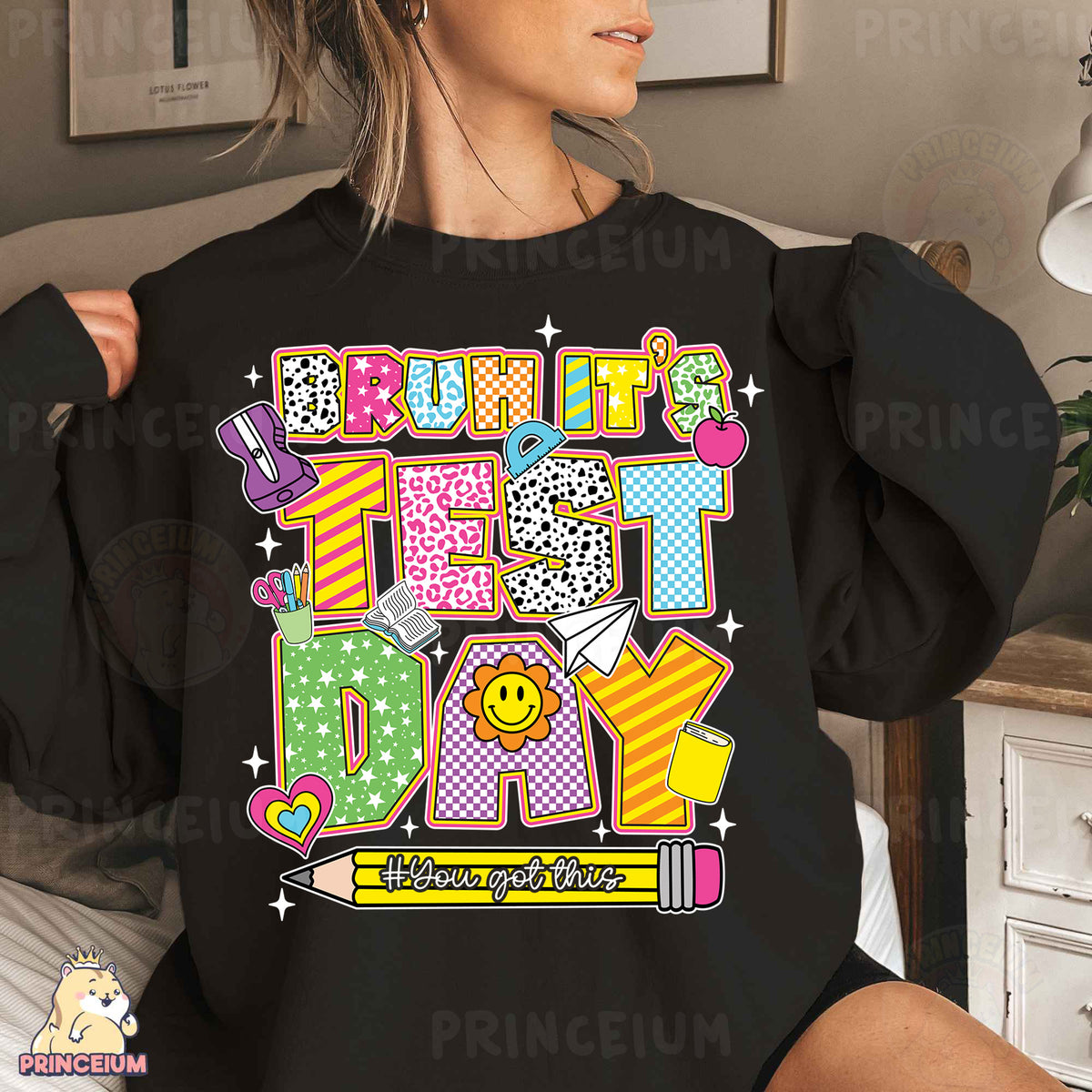 a woman wearing a black shirt that says happy birthday