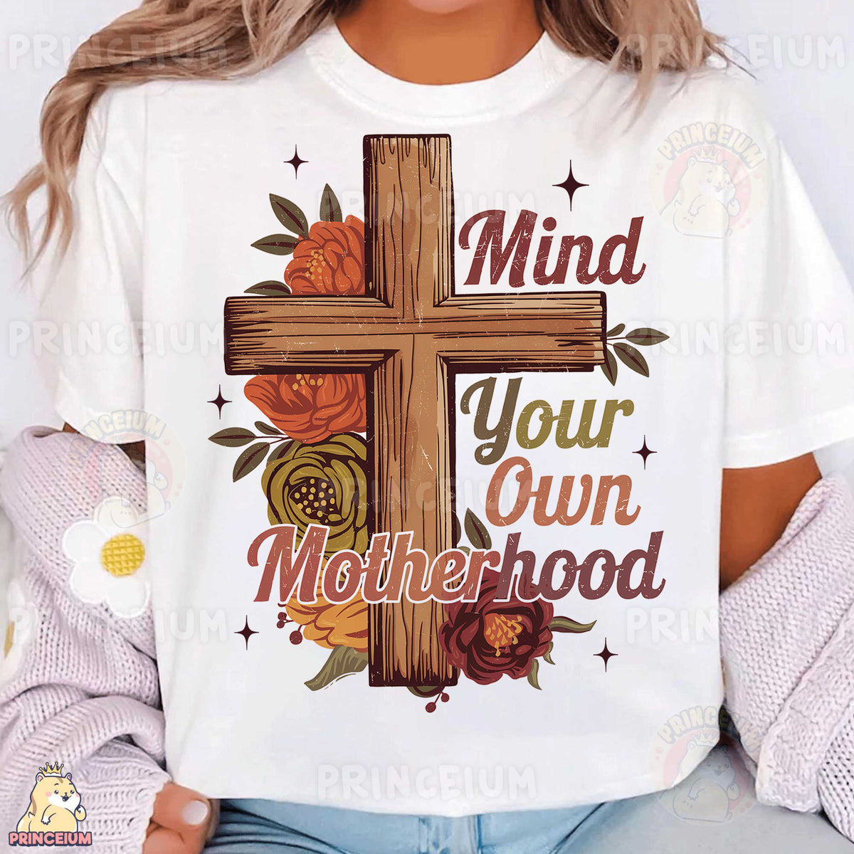 a woman wearing a t - shirt with a cross on it