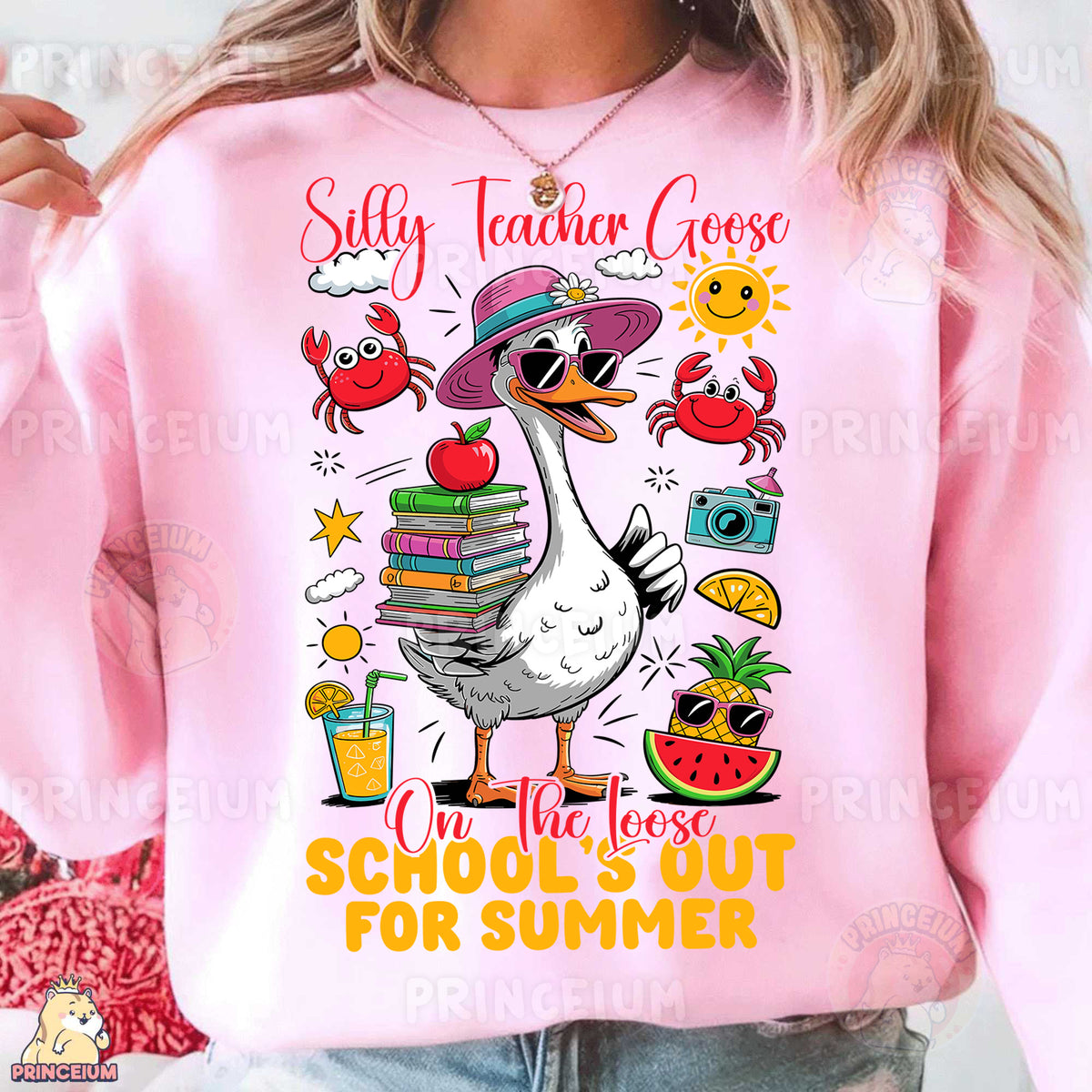 a woman wearing a pink sweatshirt with a picture of a goose and books