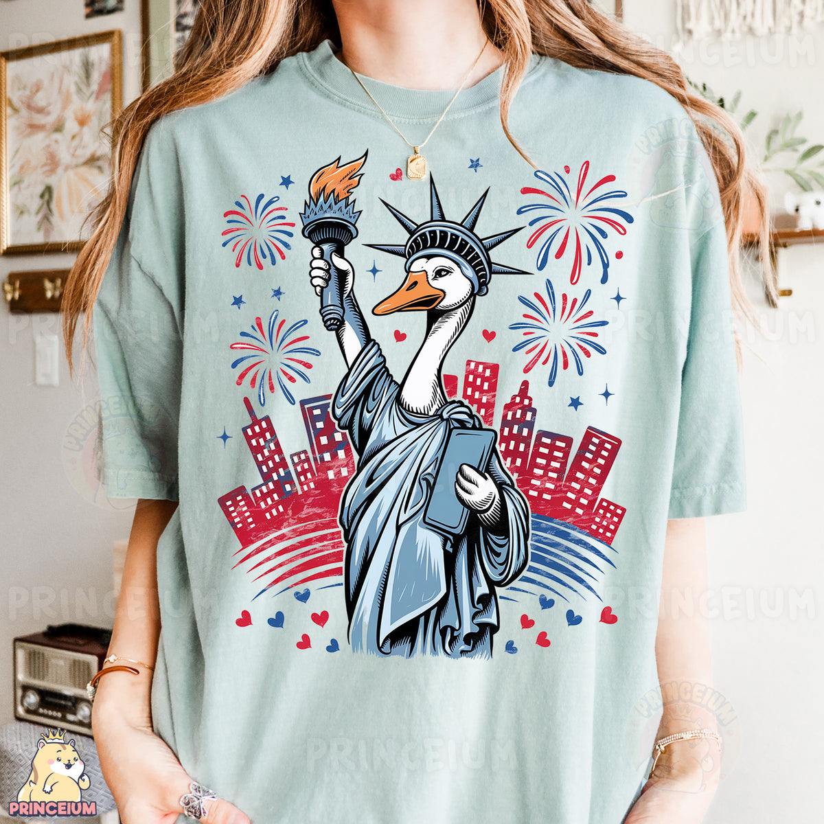a woman wearing a t - shirt with a picture of the statue of liberty
