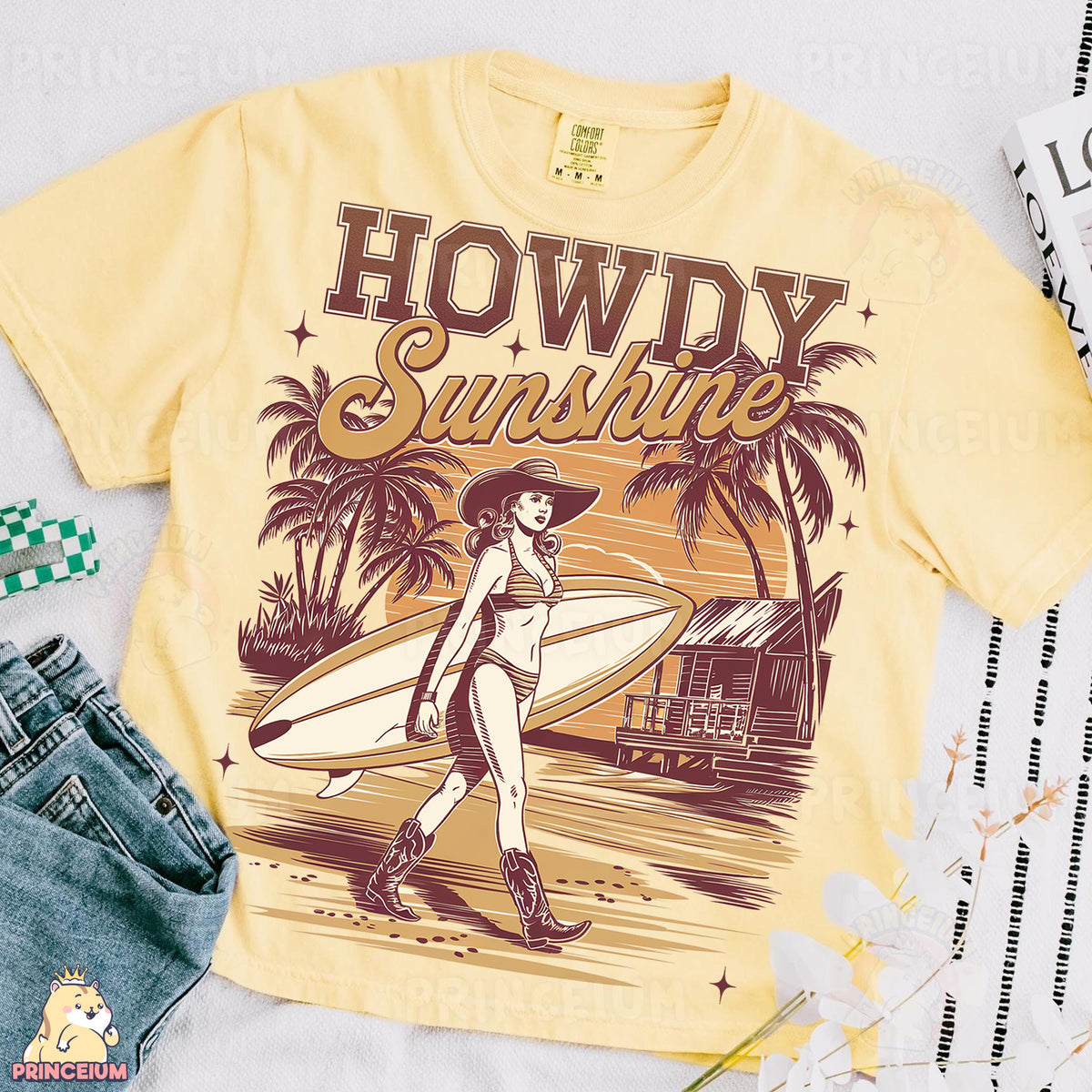a yellow t - shirt with a picture of a woman carrying a surfboard