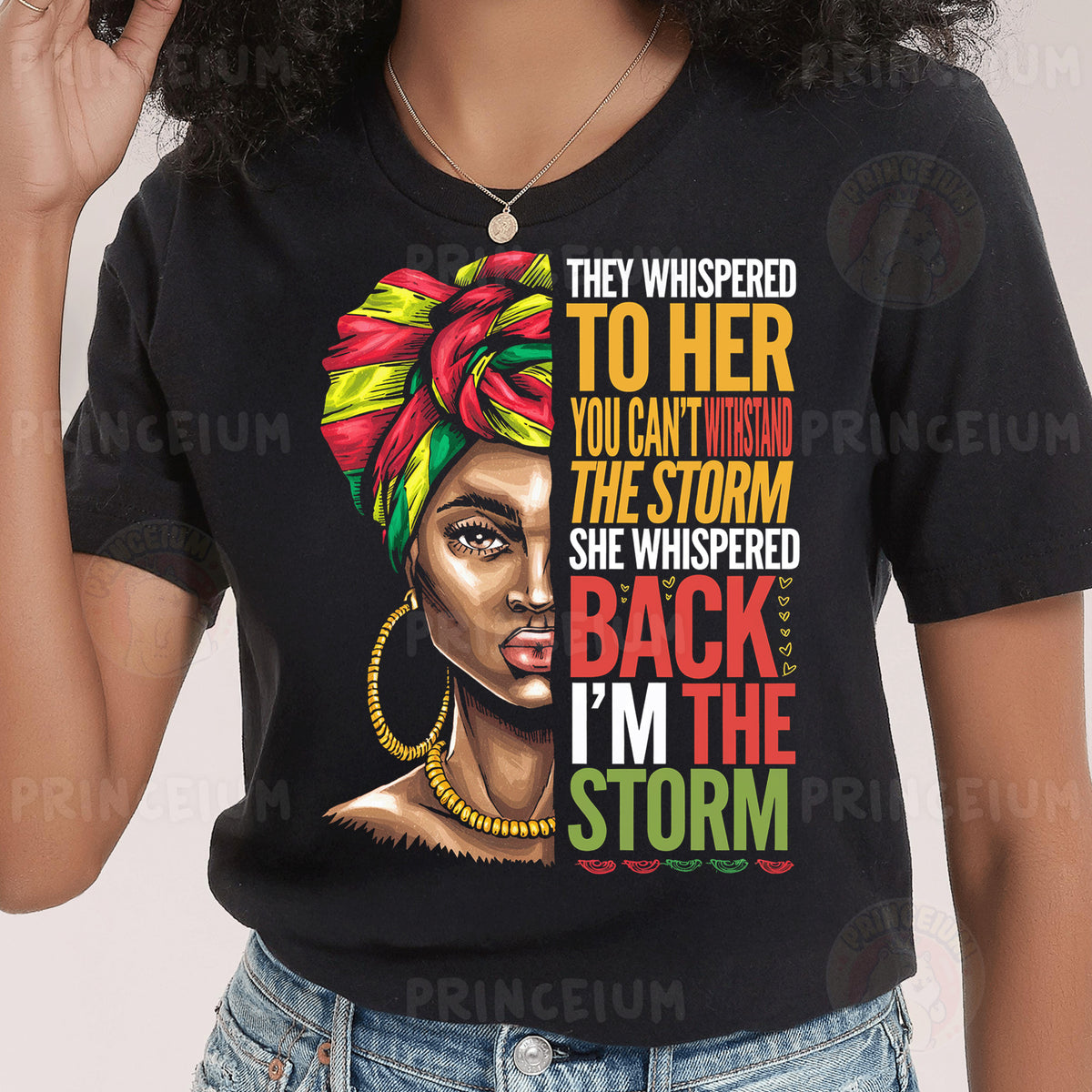 a woman wearing a black t - shirt with a picture of a woman's
