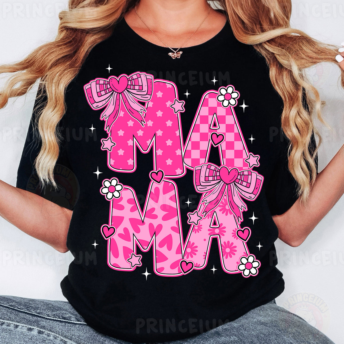 a woman wearing a black shirt with pink letters and bows