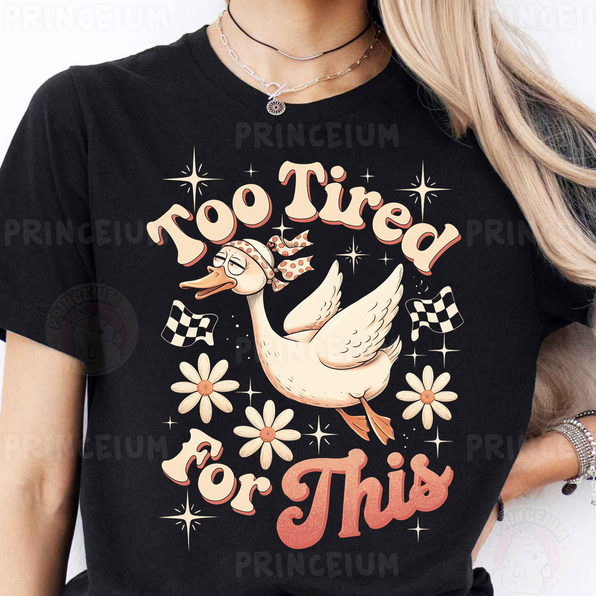a woman wearing a black shirt with a white duck on it