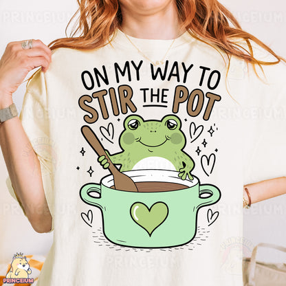 a woman wearing a t - shirt that says on my way to stir the pot