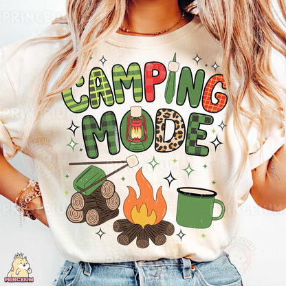 a woman wearing a t - shirt that says camping mode