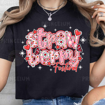a woman wearing a t - shirt that says straw berry festival