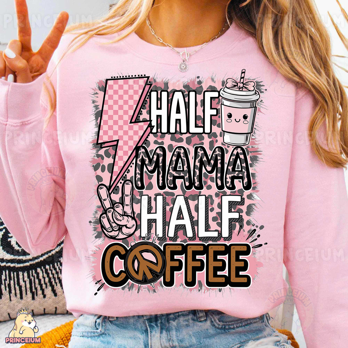 a woman wearing a pink shirt that says half mama half coffee