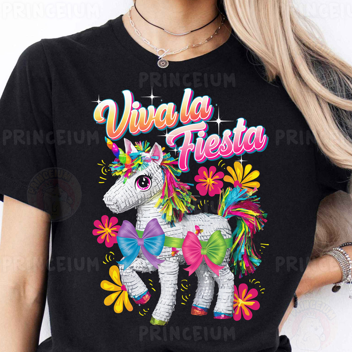 a woman wearing a black shirt with a unicorn on it