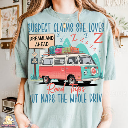 a woman wearing a t - shirt with a vw camper van on it