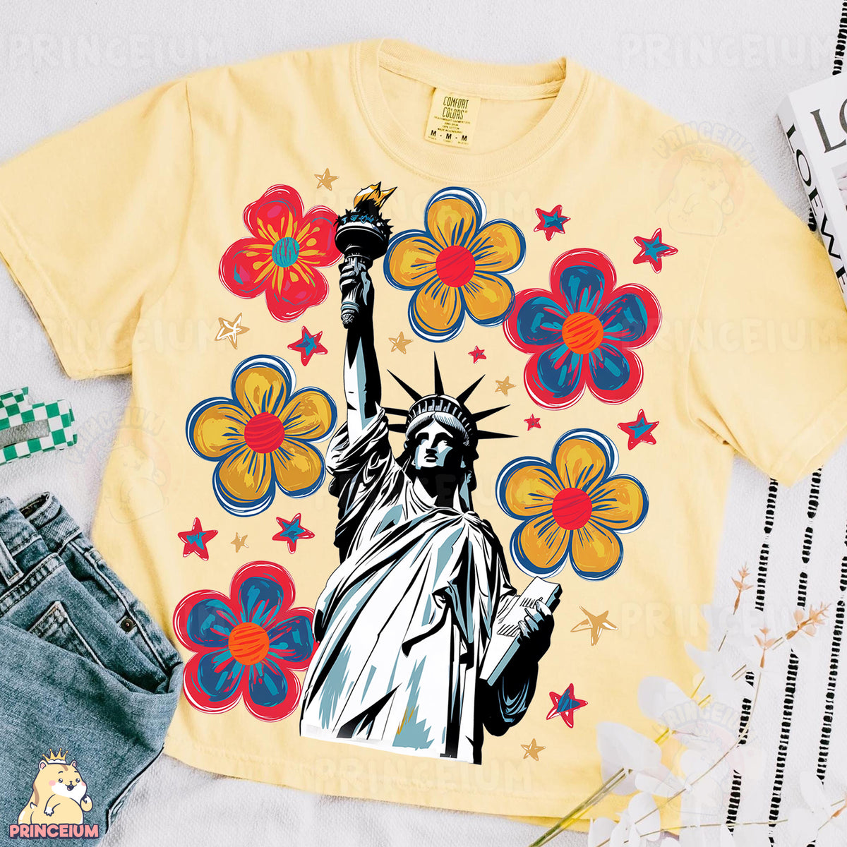 a t - shirt with the statue of liberty surrounded by flowers