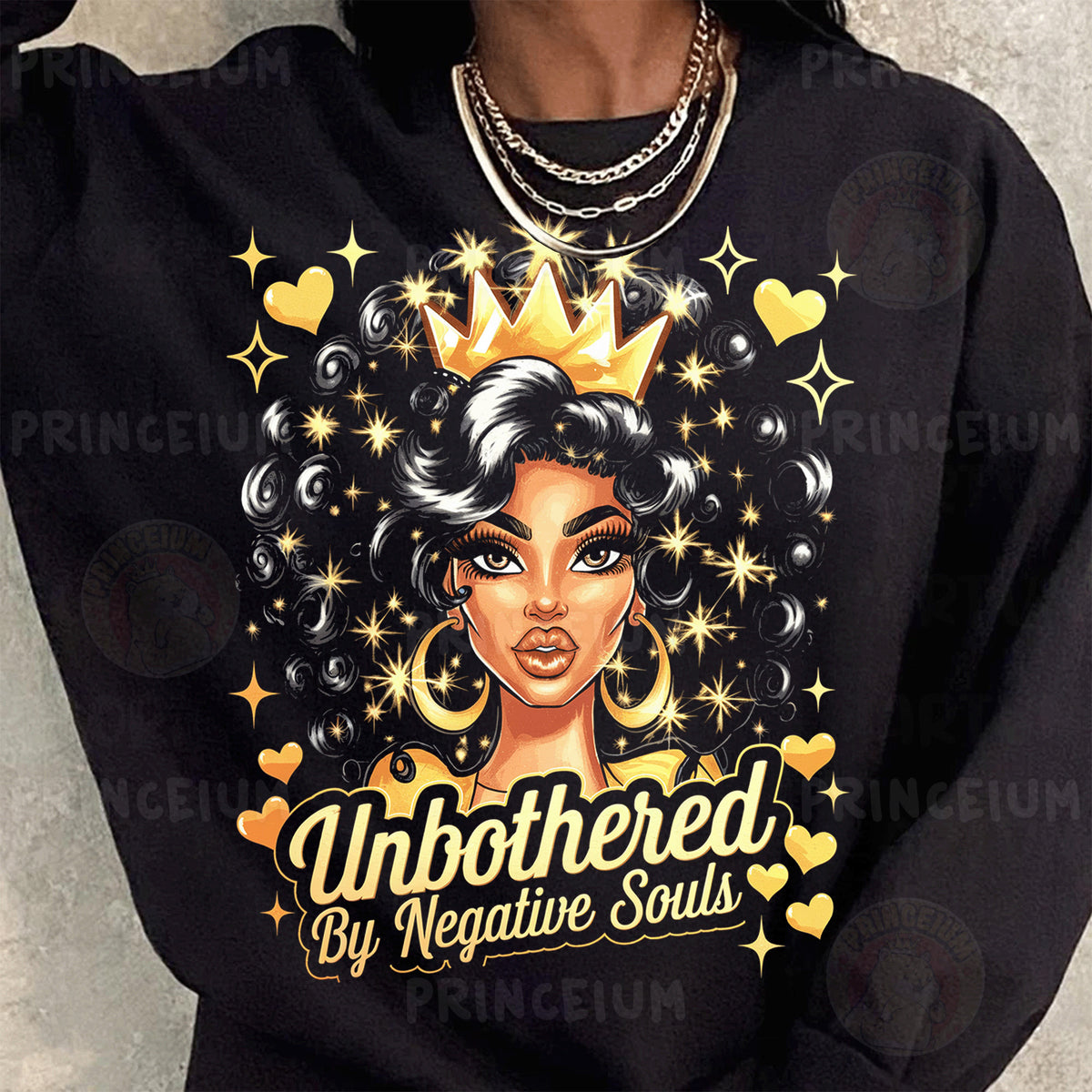 a woman wearing a black sweatshirt with a crown on her head