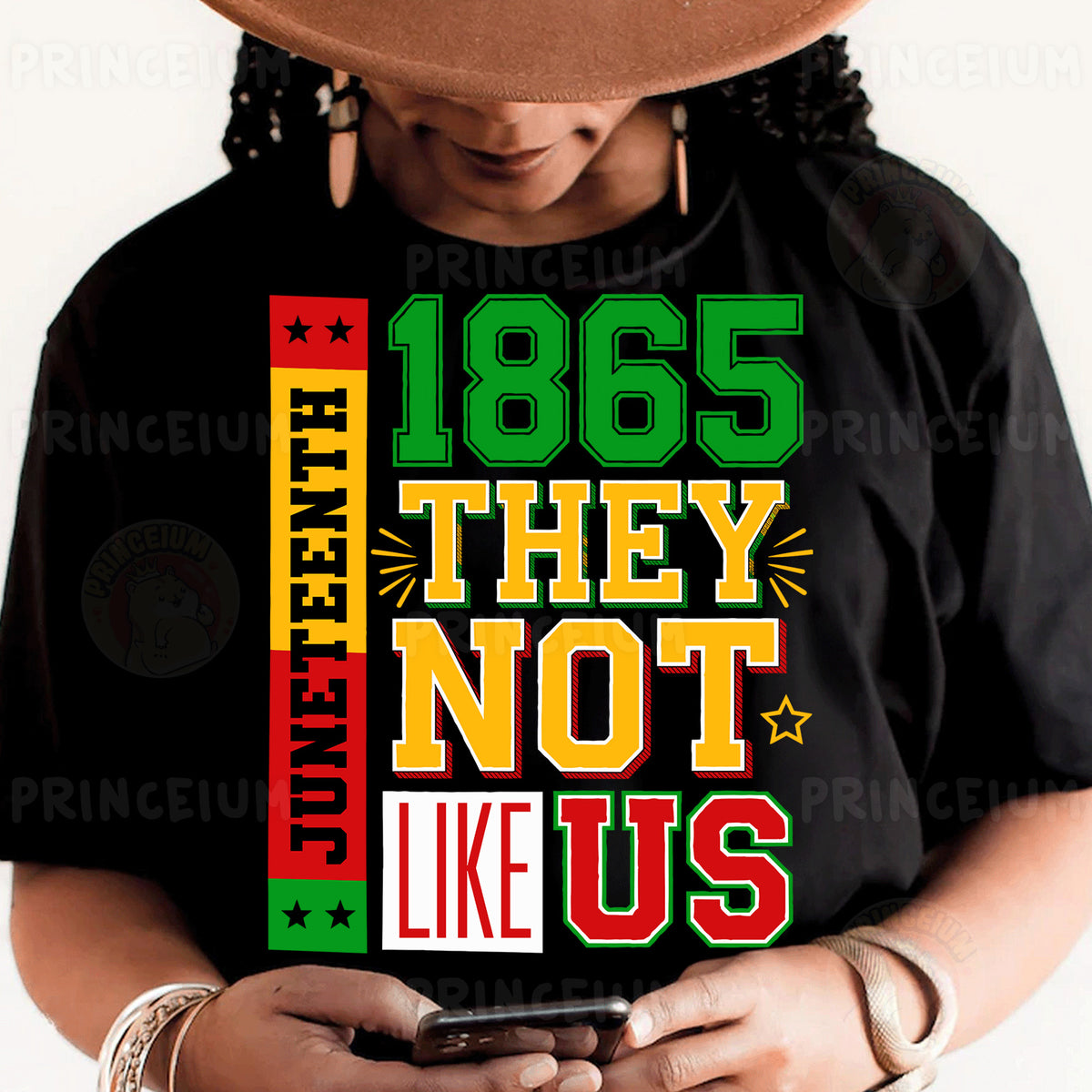 a person wearing a black shirt and a hat holding a cell phone