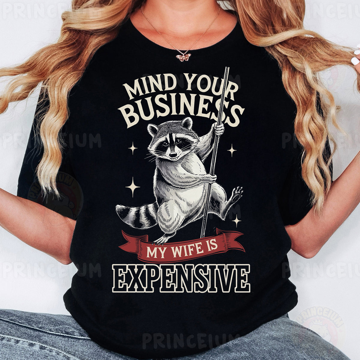 a woman wearing a black shirt with a raccoon on it