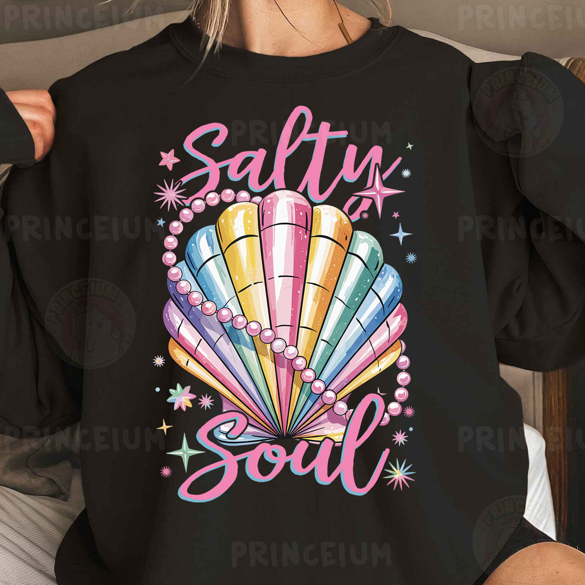 a woman wearing a black shirt that says salty soul