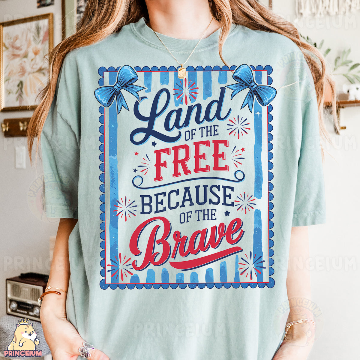 a woman wearing a t - shirt that says land of the free because of the