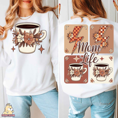 a woman wearing a mom life sweatshirt and jeans