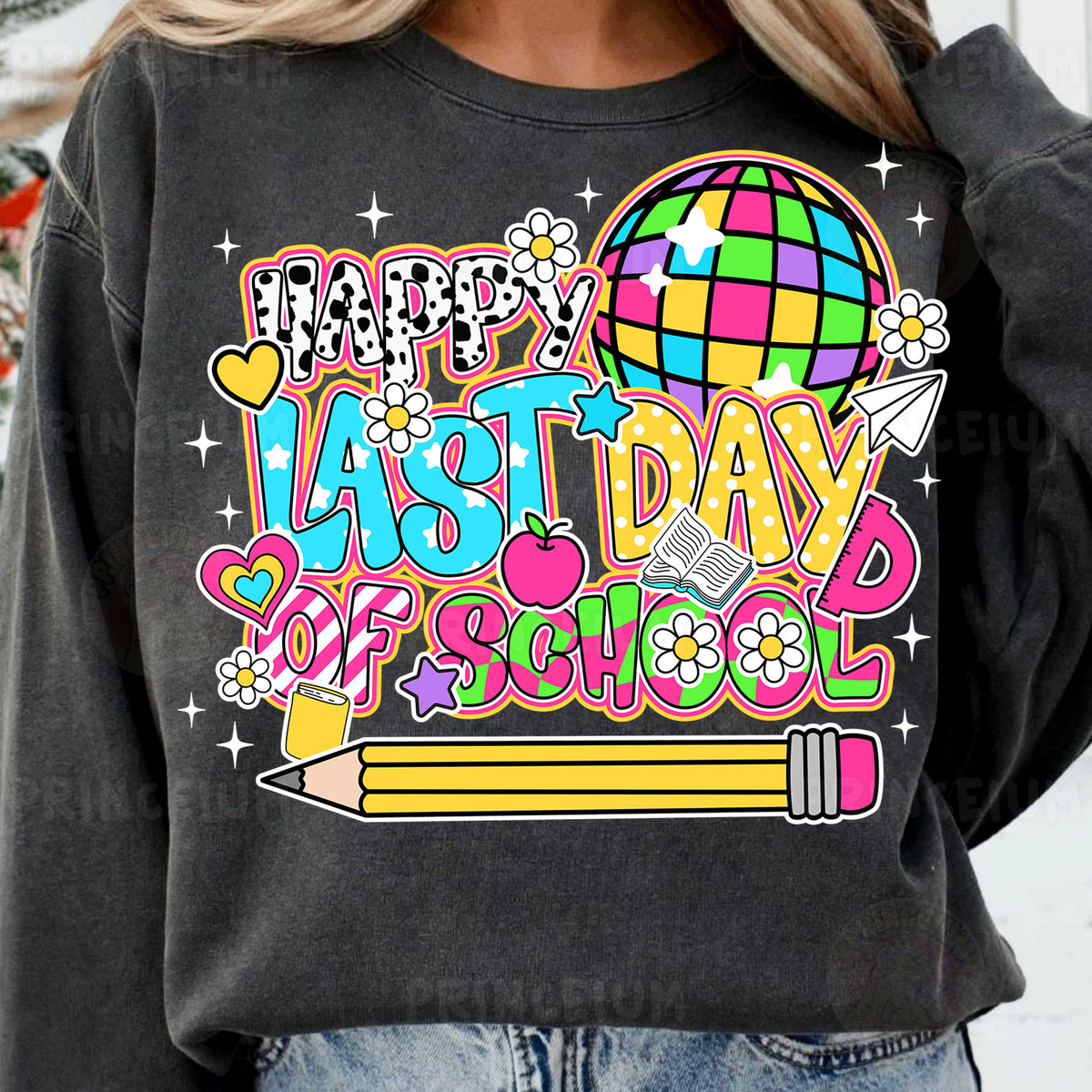 a woman wearing a sweatshirt that says happy last day of school