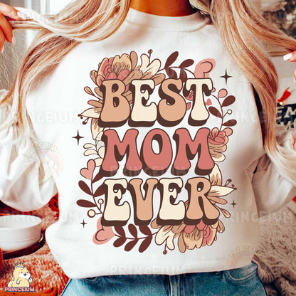 a woman wearing a t - shirt that says best mom ever