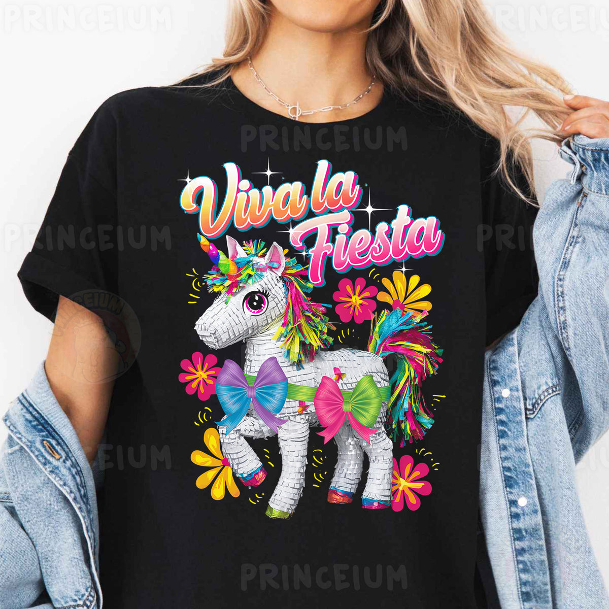 a woman wearing a black shirt with a unicorn on it
