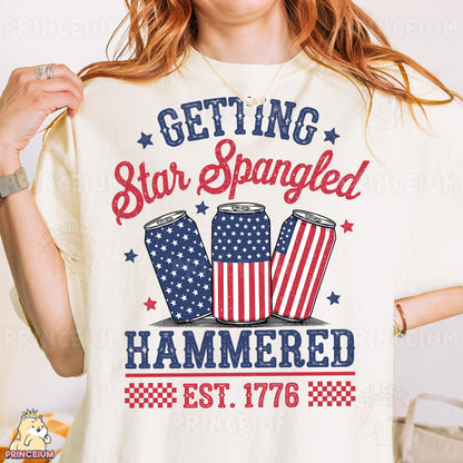a woman wearing a t - shirt that says getting star spangled hammered