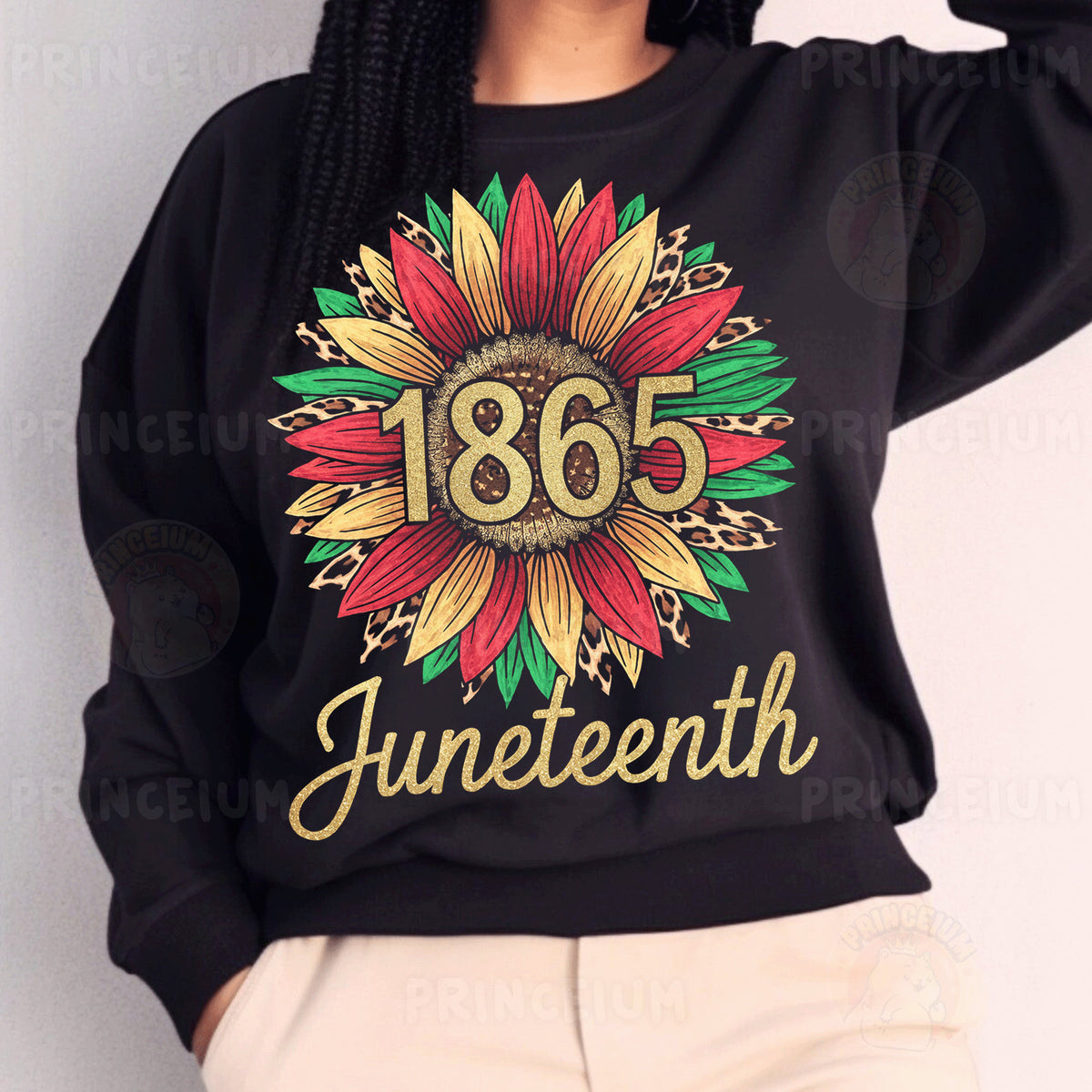 a woman wearing a black sweatshirt with a sunflower on it