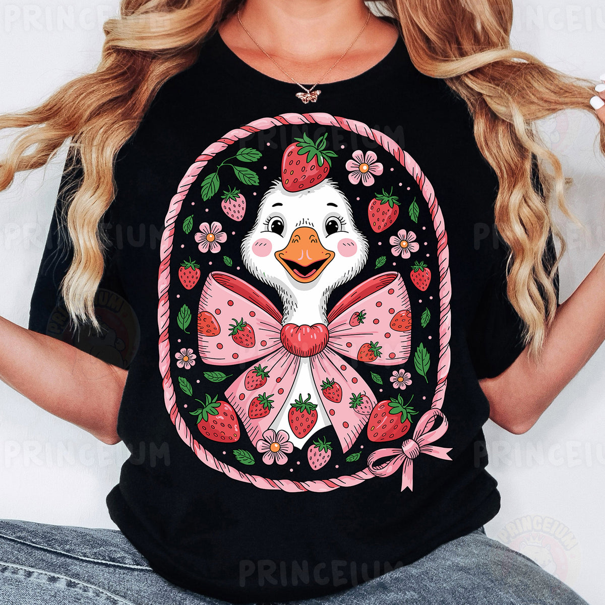a woman wearing a black t - shirt with a picture of a duck wearing a
