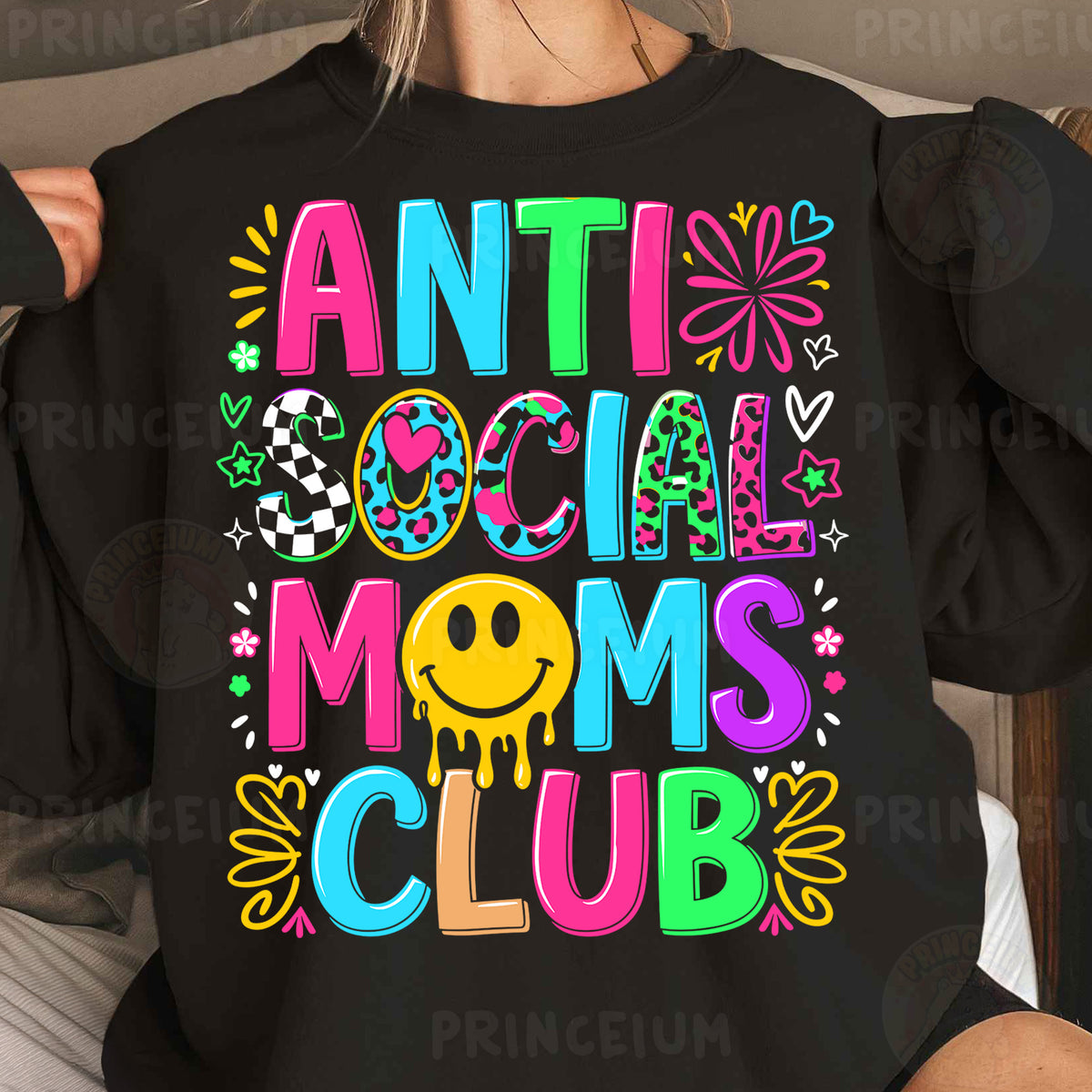 a woman wearing an anti social moms club shirt