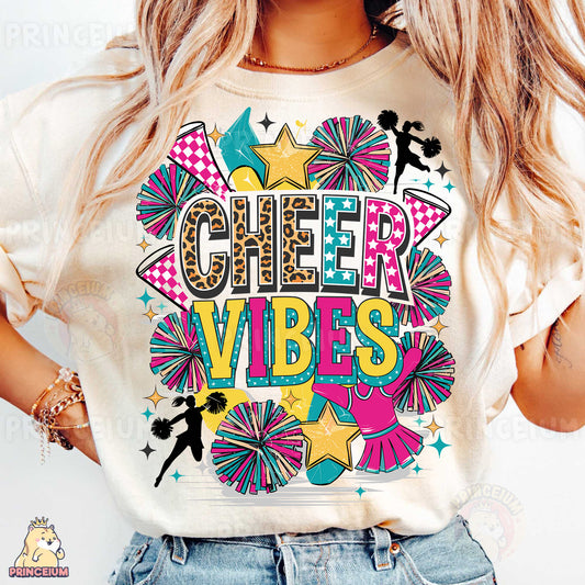 a woman wearing a cheer vibes t - shirt