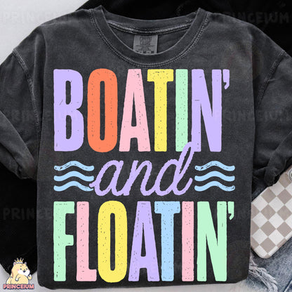 a t - shirt that says boatin and floatin on it