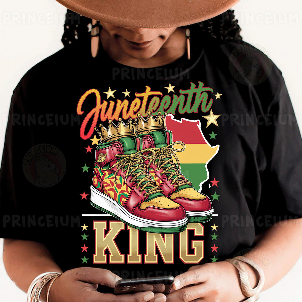 a person wearing a black shirt and a hat holding a cell phone