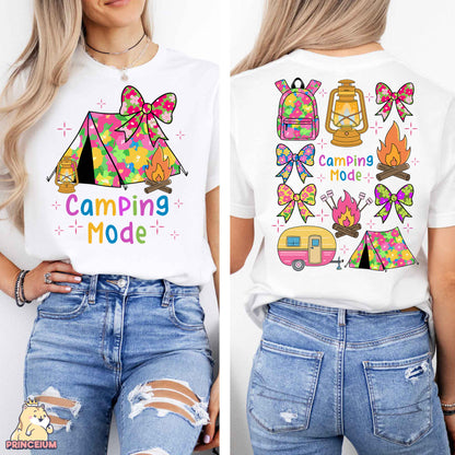 a woman wearing a camping mode t - shirt