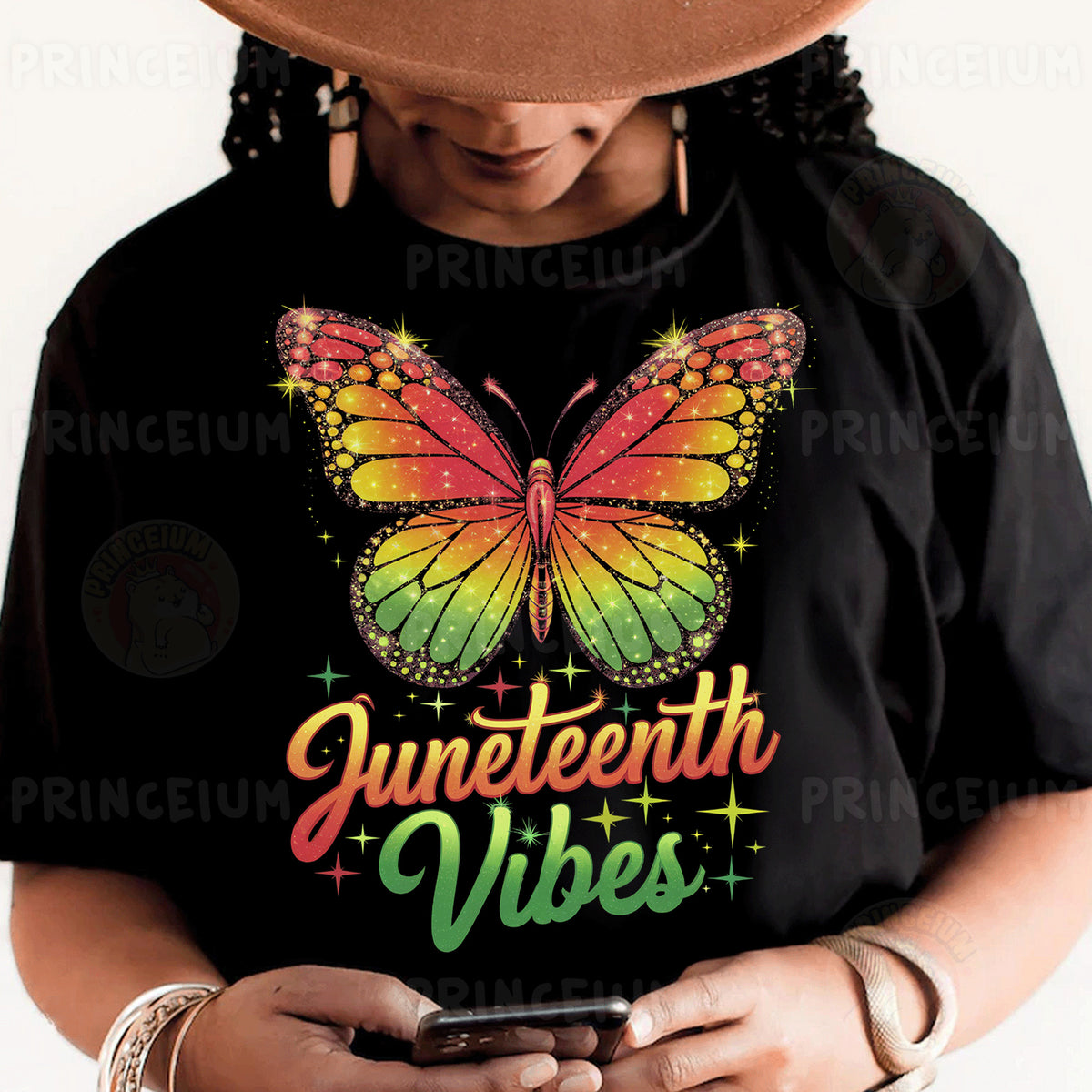 a woman wearing a black shirt with a butterfly on it