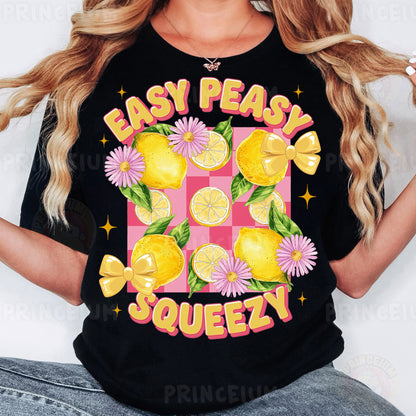 a woman wearing a t - shirt that says easy peasy squeezezy