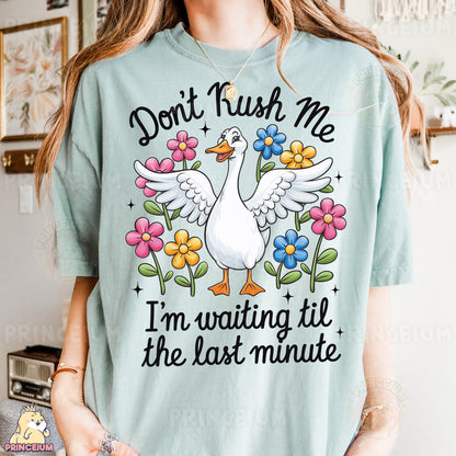 a woman wearing a t - shirt that says don't rush me i '