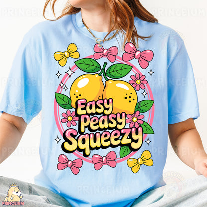 a woman wearing a t - shirt that says easy peasy sqeezy