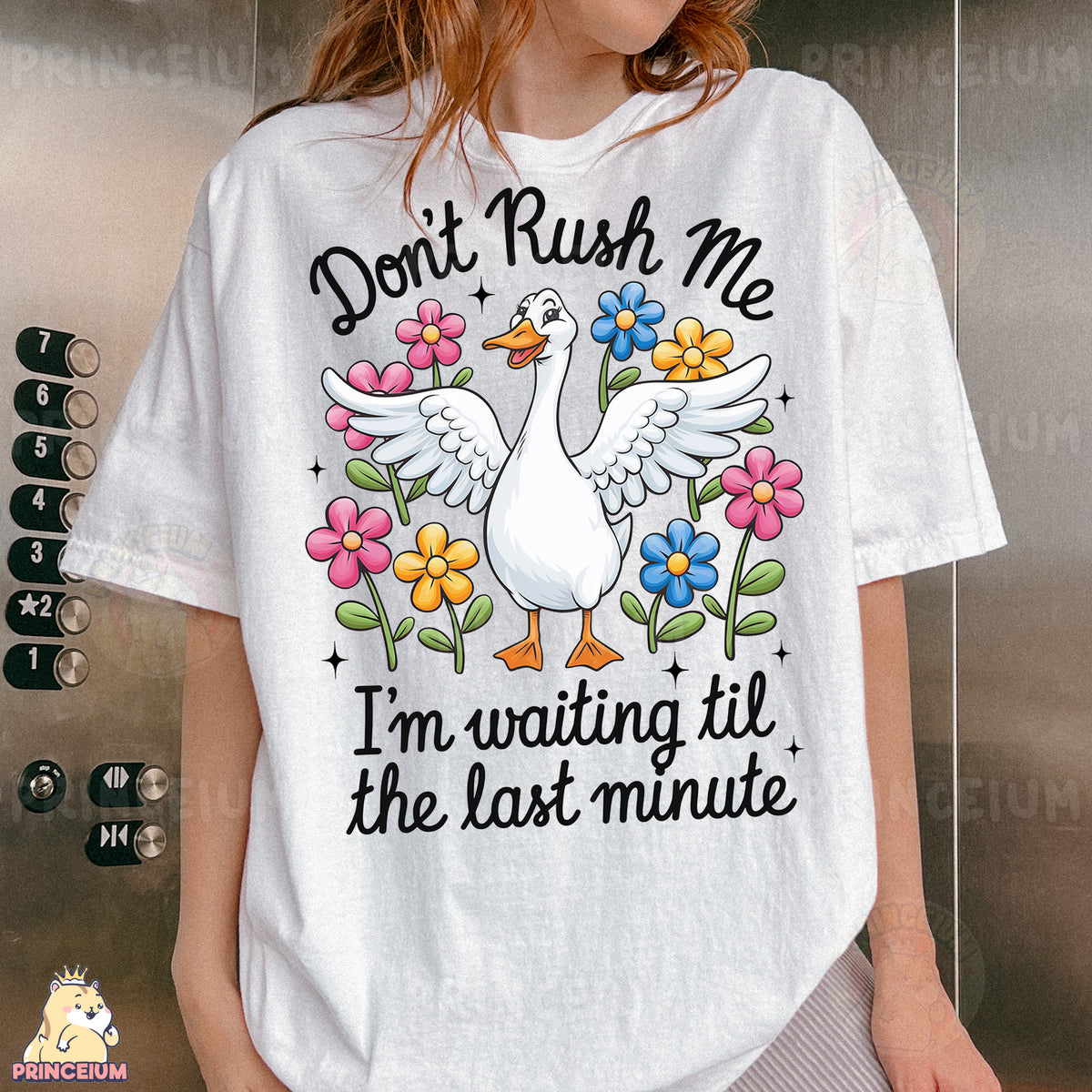 a woman wearing a white t - shirt with a goose on it