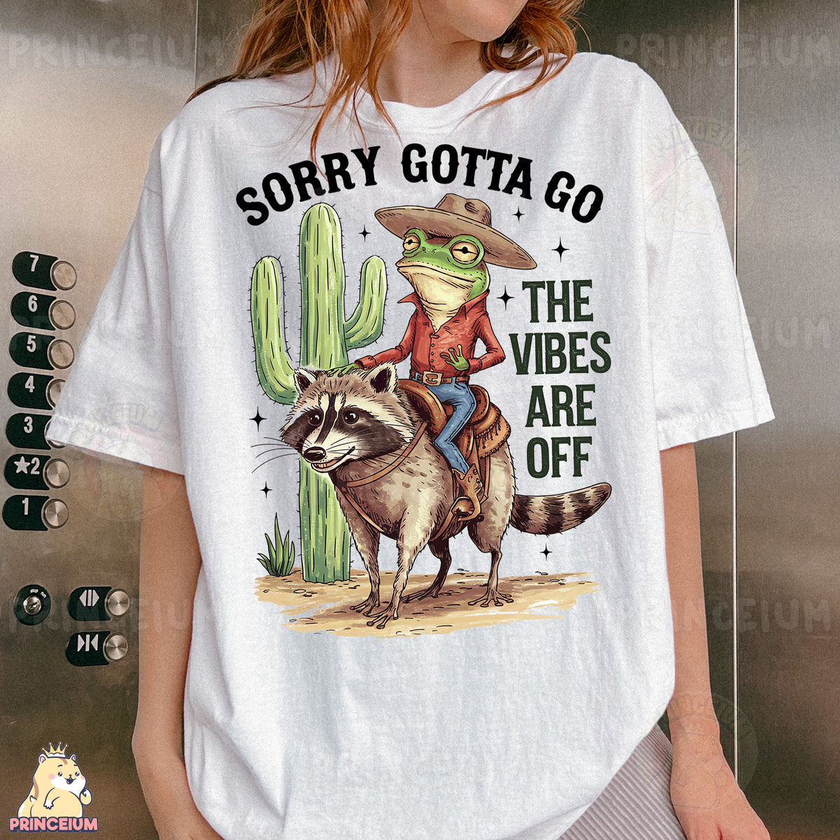 a woman wearing a white shirt with a racoon on it